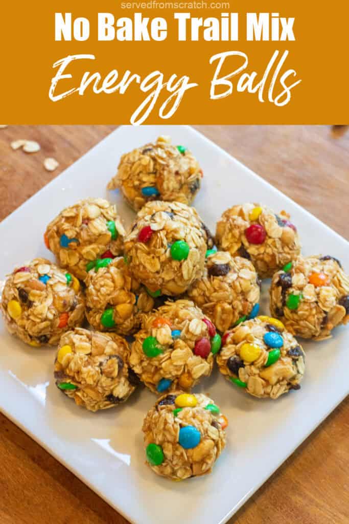a tray of oat balls with raisins and m&ms with Pinterest pin text.