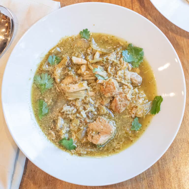 an overhead of a bowl of chili pork verde.