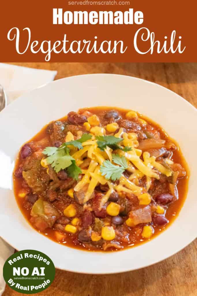 a bowl of chili with cheese and cilantro and Pinterest pin text and NO AI sticker.
