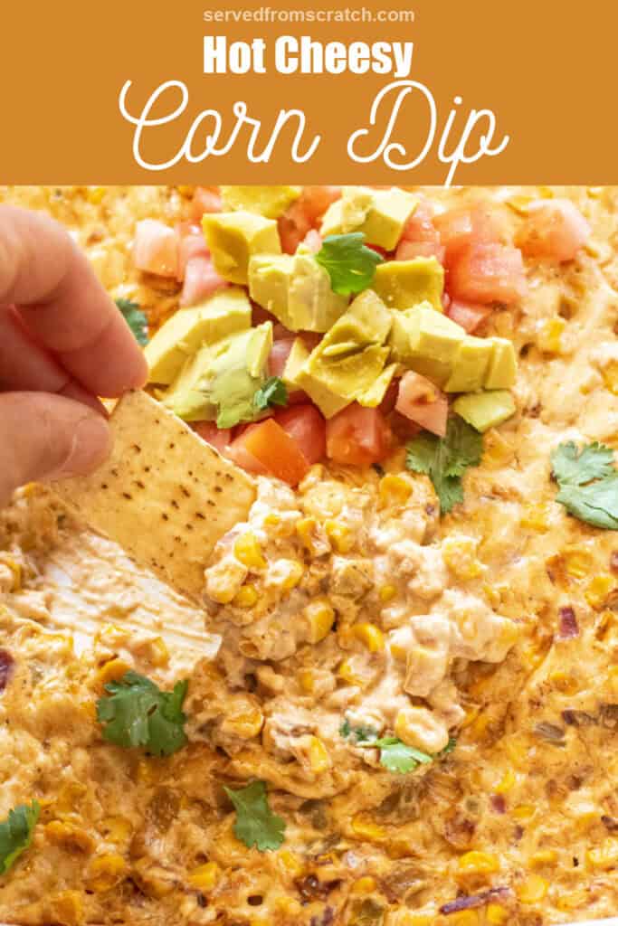 a chip dipping into cheesy corn dip with Pinterest pin text.