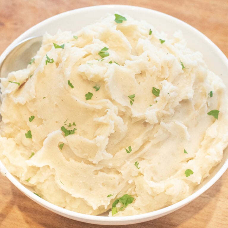 a bowl of creamy mashed potatoes.