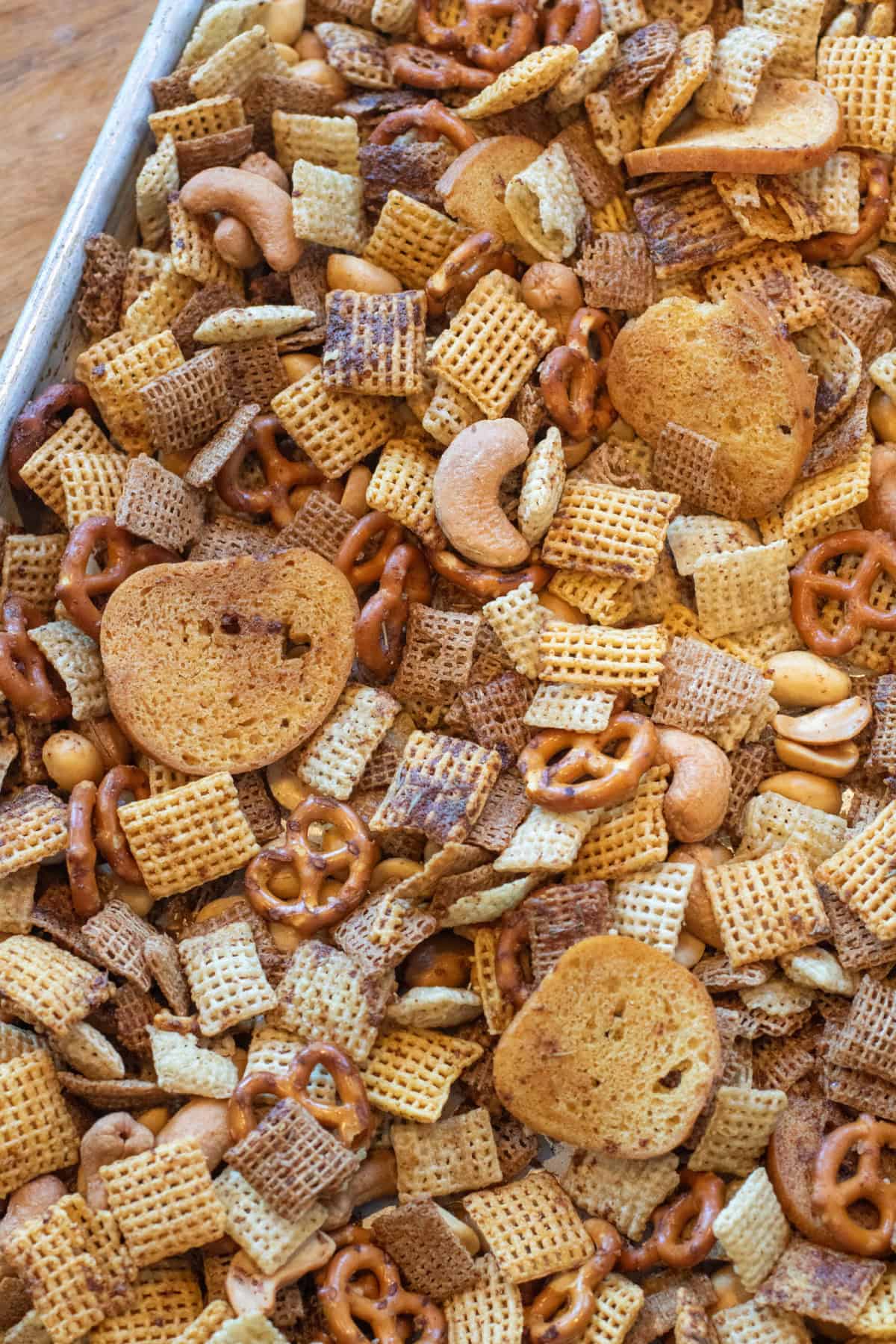 a tray of baked chex mix.
