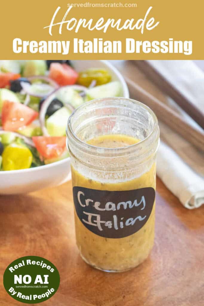 a jar of open italian salad dressing labeled creamy italian in front of a bowl of salad with Pinterest pin text with NO AI sticker.