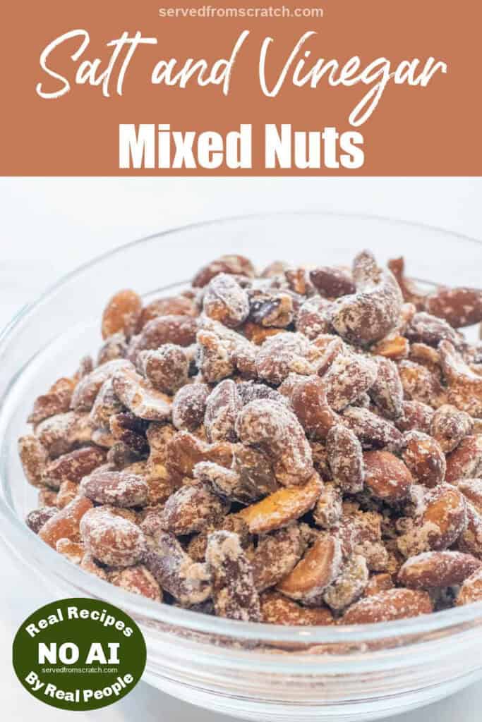 a large bowl of salt and vinegar coated nuts with Pinterest pin text and NO AI sticker.