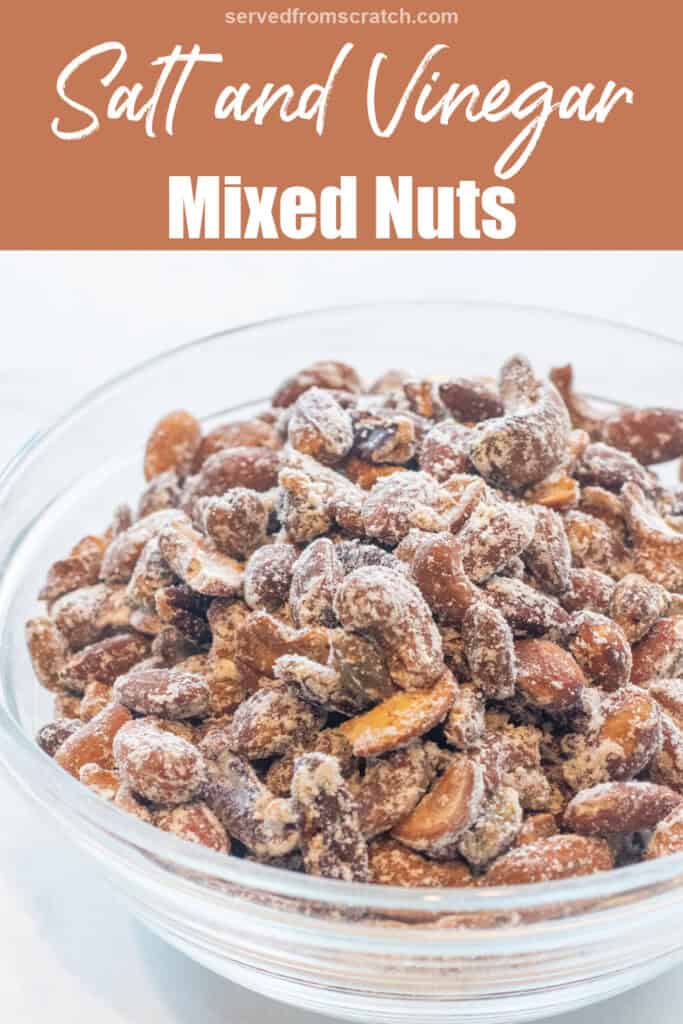 a bowl of mixed nuts with vinegar powder in a bowl with Pinterest pin text.