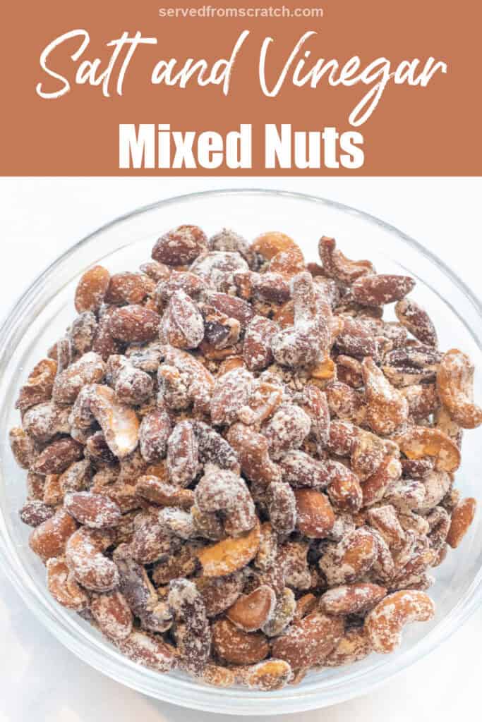a bowl of mixed nuts with vinegar powder in a bowl with Pinterest pin text.