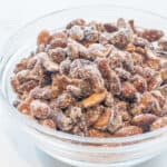 a bowl of mixed nuts with vinegar powder in a bowl.