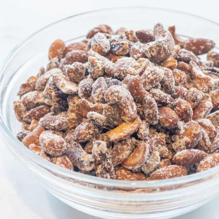 a bowl of mixed nuts with vinegar powder in a bowl.