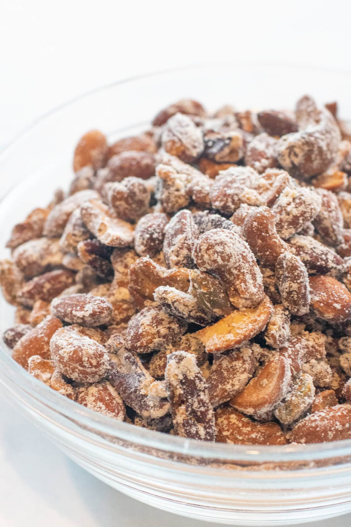a bowl of mixed nuts with vinegar powder in a bowl.