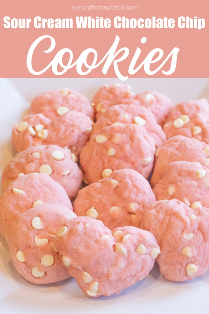 a plate of pink cookies, some heart shaped and with white chocolate chips with Pinterest pin text.