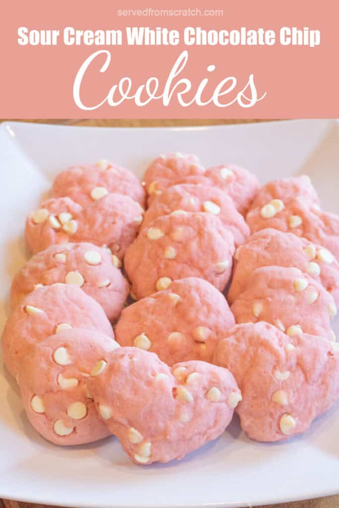 a plate of pink cookies, some heart shaped and with white chocolate chips with Pinterest pin text.