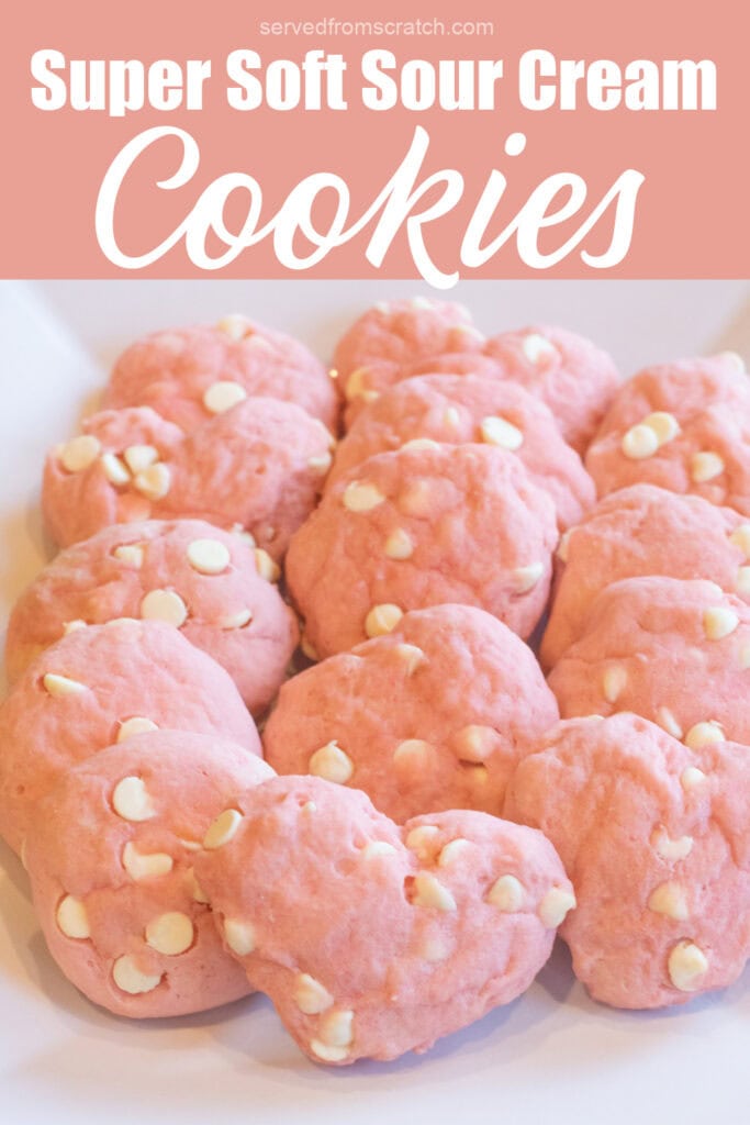 a plate of pink cookies, some heart shaped and with white chocolate chips with Pinterest pin text.