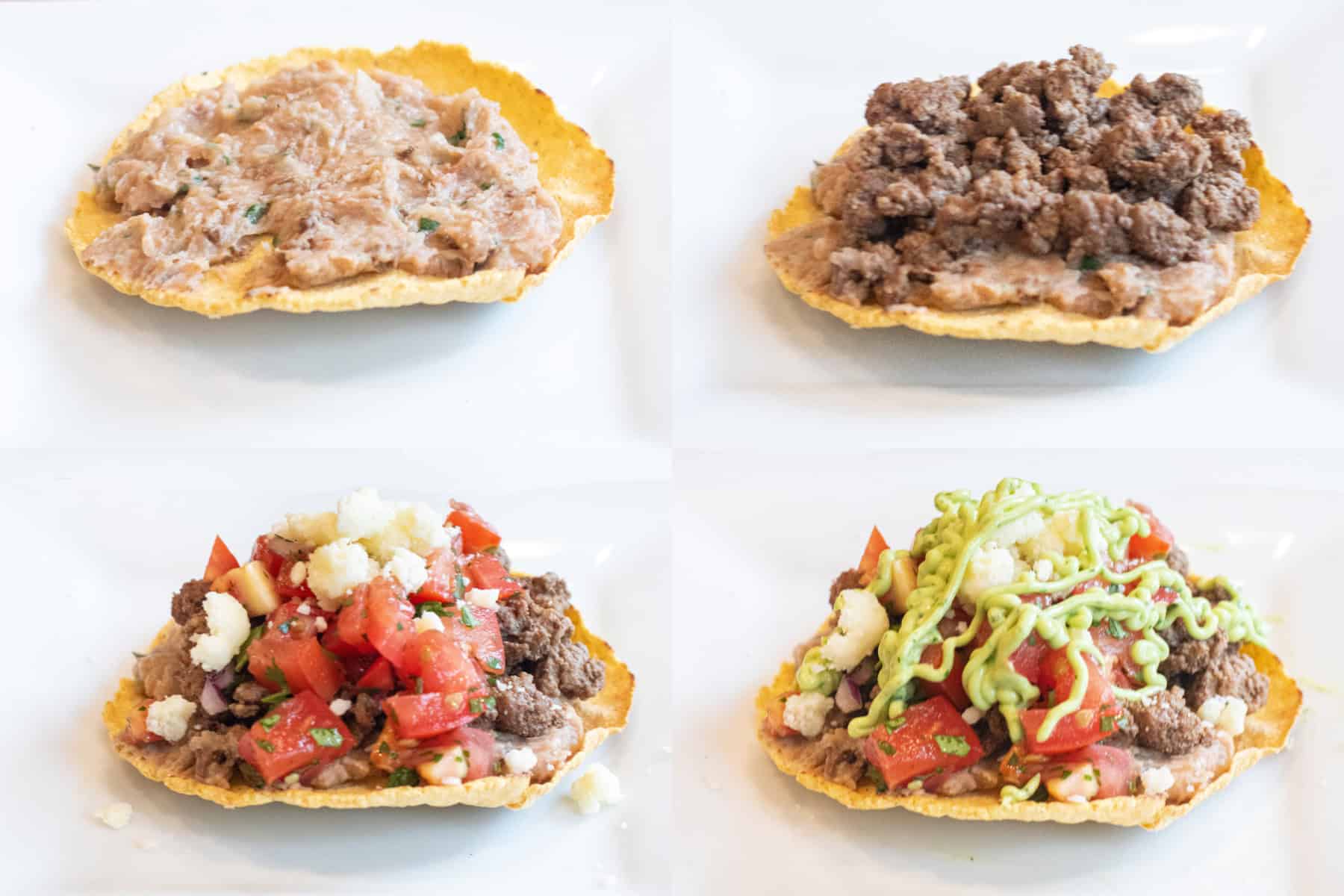4 tostada shells, one with refried beans, then topped with cooked ground beef, then with pico and cotija, and finally with a drizzle of avocado cream sauce.