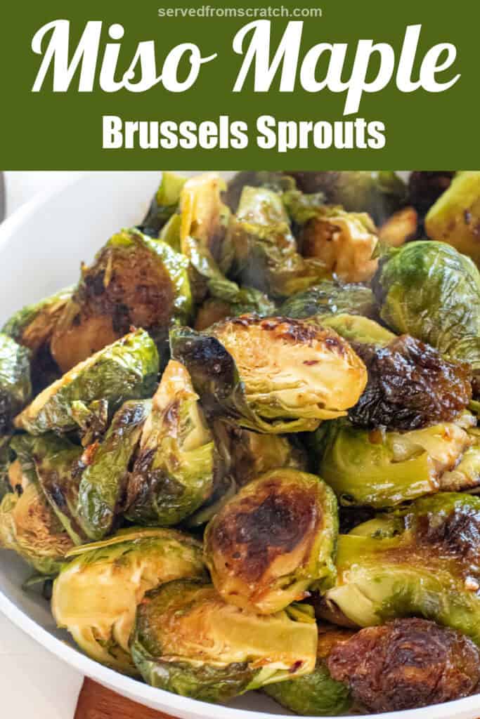 a large wide bowl of roasted and glazed brussels sprouts with Pinterest pin text.