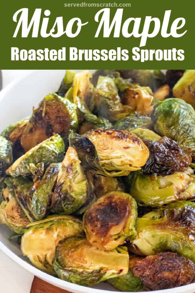 a large wide bowl of roasted and glazed brussels sprouts with Pinterest pin text.