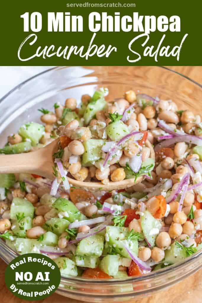 a bowl of chickpeas, beans, cucumber, tomatoes, onions, and feta with a spoonful in a wooden spoon with Pinterest pin text and NO AI sticker.