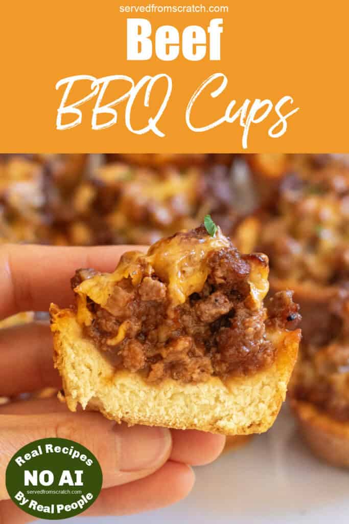 a hand holding a halved baked pastry cup of ground beef and melted cheese with Pinterest pin text and NO AI sticker.
