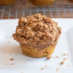 a pumpkin muffin with a crumble on top.