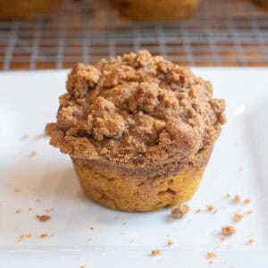 a pumpkin muffin with a crumble on top.