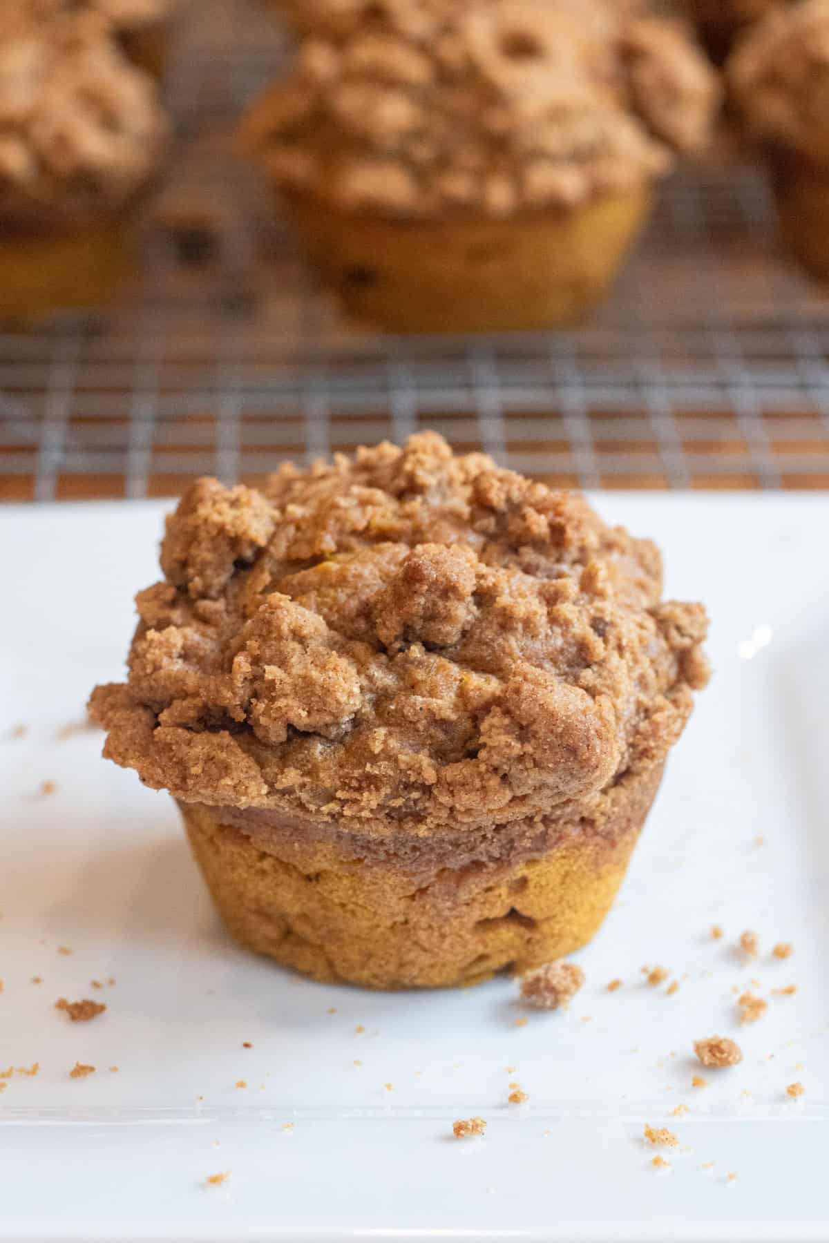 a pumpkin muffin with a crumble on top.